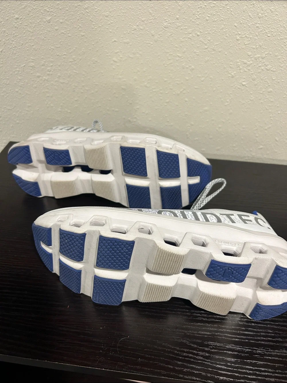 On Running White and Blue Cloudmonster Sneakers